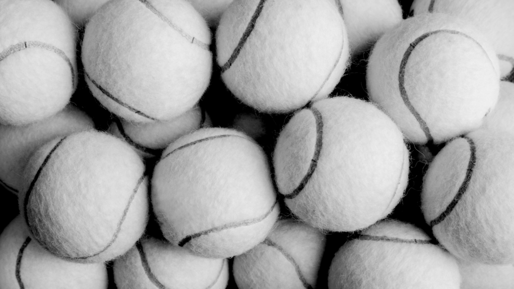 Black and white close-up of tennis balls used for a Gesiggie marketing strategy blog.